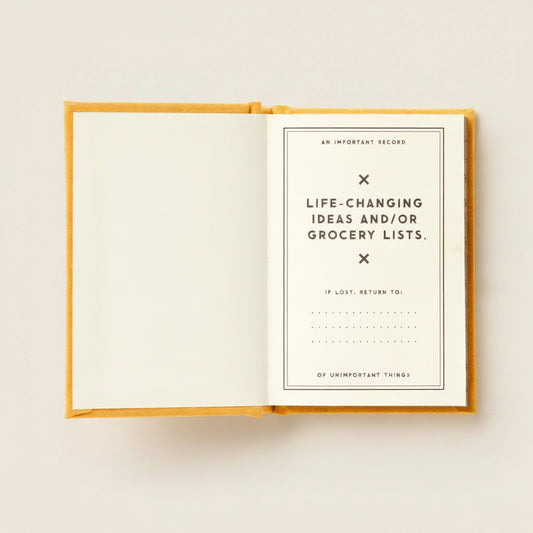 Open book with a title page on a white background
