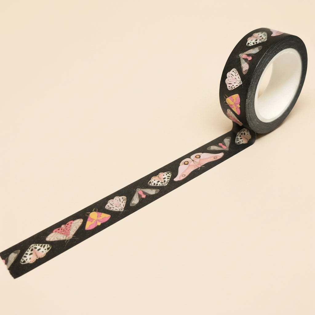 A roll of the Moth washi tape on a white background