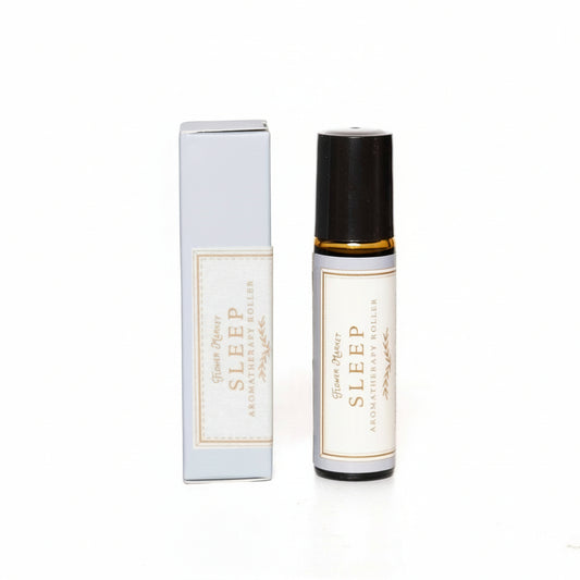 Sleep aromatherapy rollerball with packaging on a white background