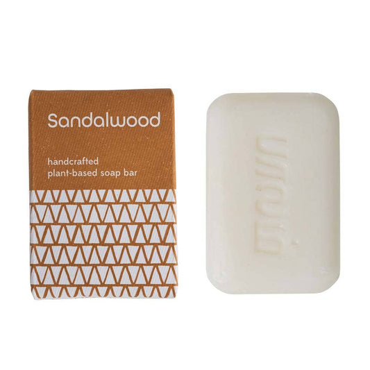 Sandalwood handcrafted plant-based soap bar with packaging on a white background