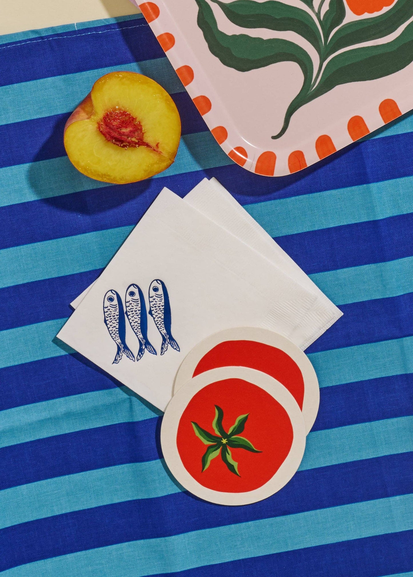 Tomato coasters used on a summer event table.