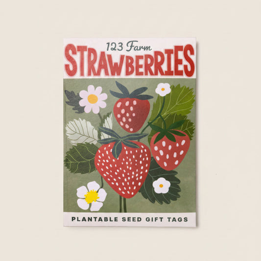 Pack of plantable seed gift tags with strawberries and flowers on a white background