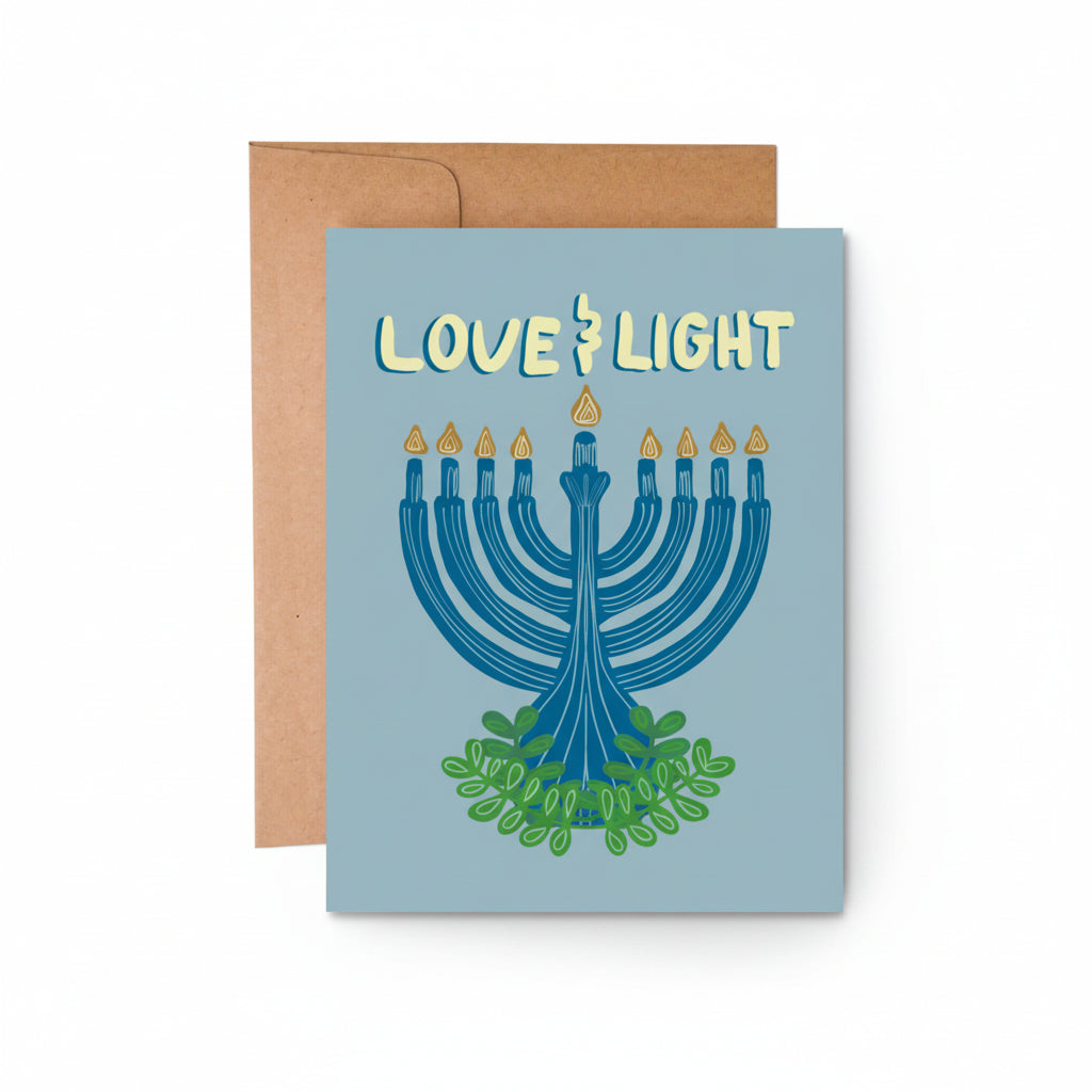 Hanukkah greeting card with glowing menorah design and elegant script
