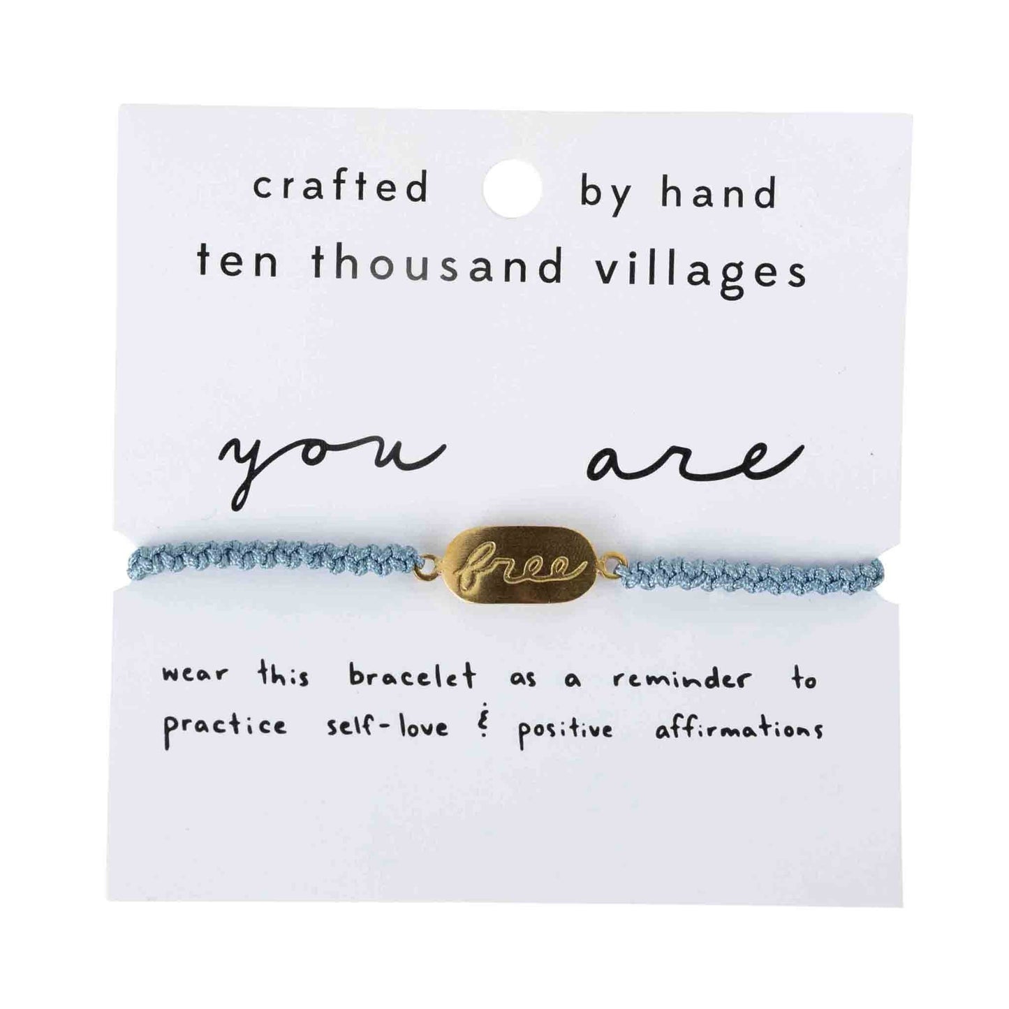 Bracelet with 'you are free' tag on a card from Ten Thousand Villages