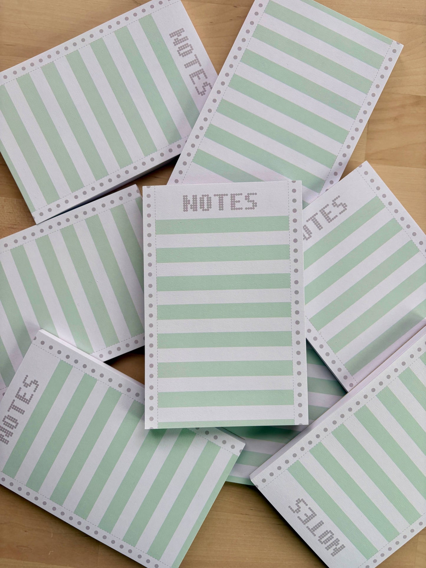 Vintage-inspired notepad with playful dot matrix edge
