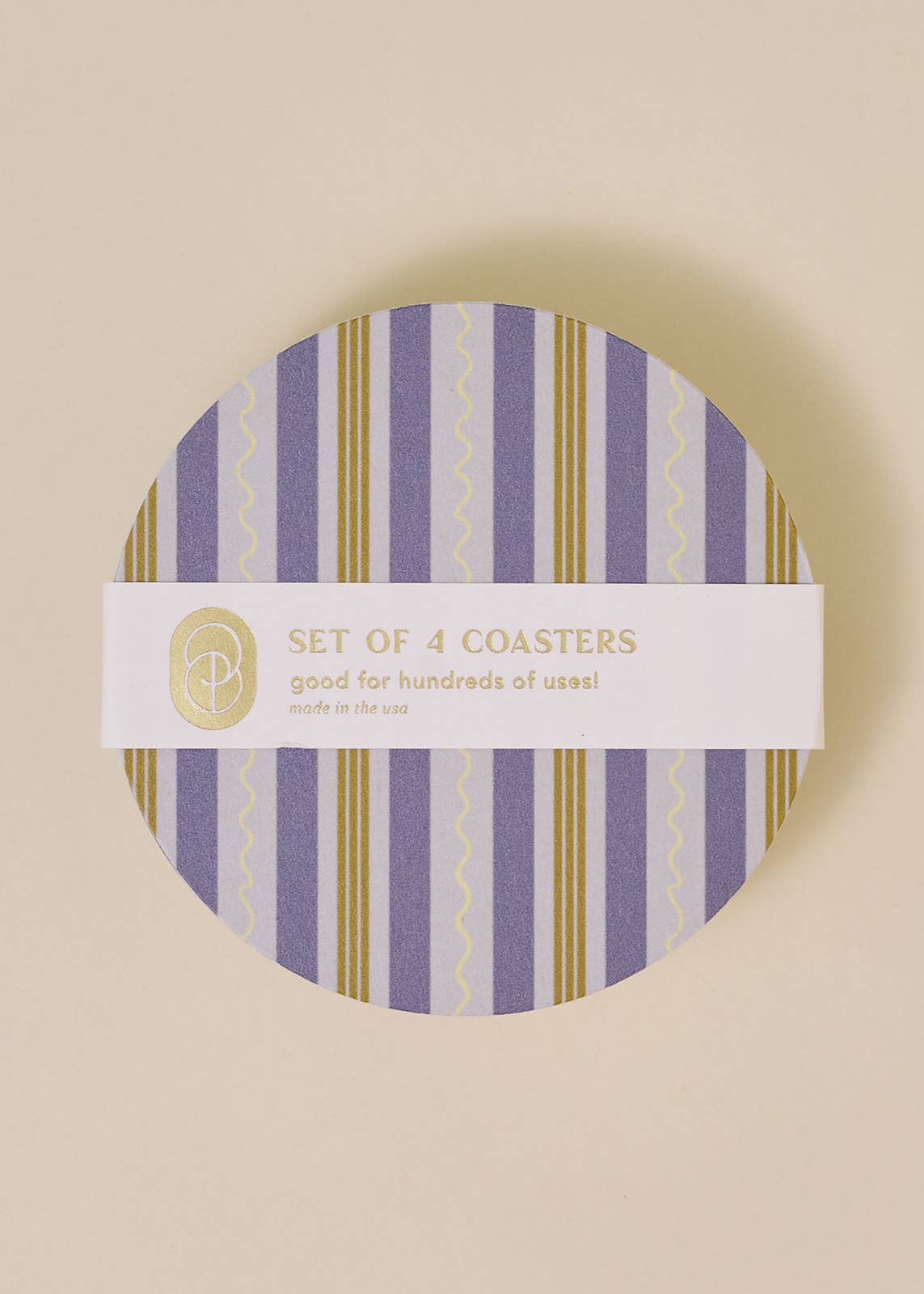 Close up of the vibrant blue hand-drawn stripes and squiggles on the "Playful Squiggle Stripes Coasters".