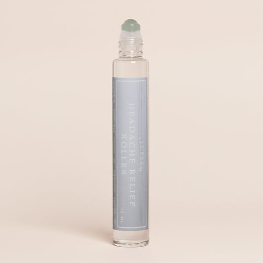Roll-on bottle with a white cap on a white background