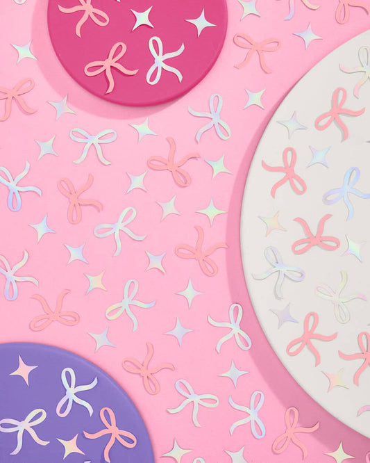 Tying the Knot confetti with pink bows and iridescent foil sparkles for bridal celebrations and gift boxes