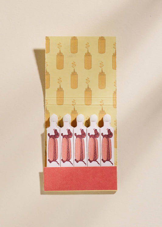 Adorable dachshund design on the "HOT Dog Matches"