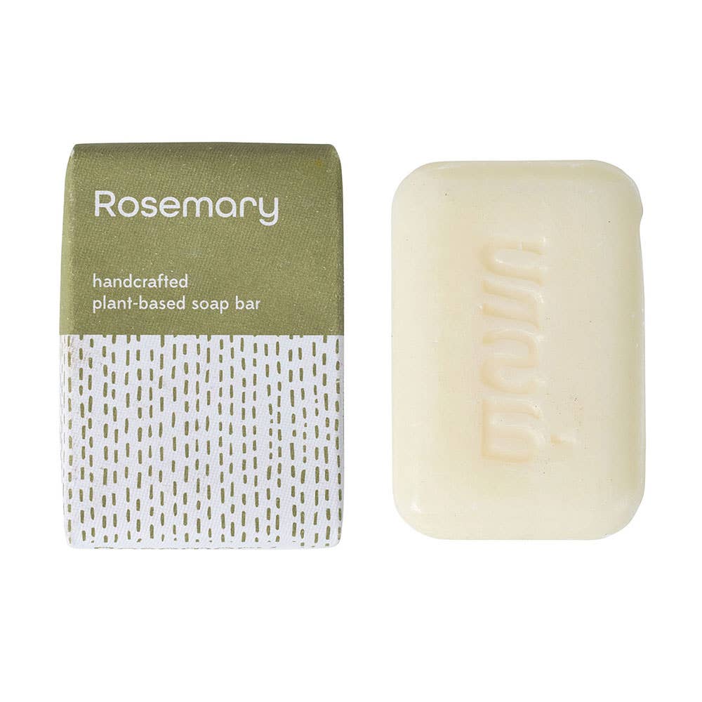 Close-up of handcrafted rosemary soap showing natural texture
