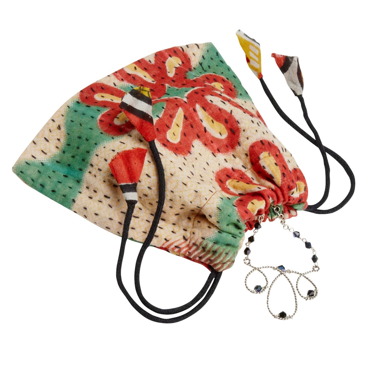 Gift bag holding a jewelry gift for a friend in this bright Recycled Sari gift bag