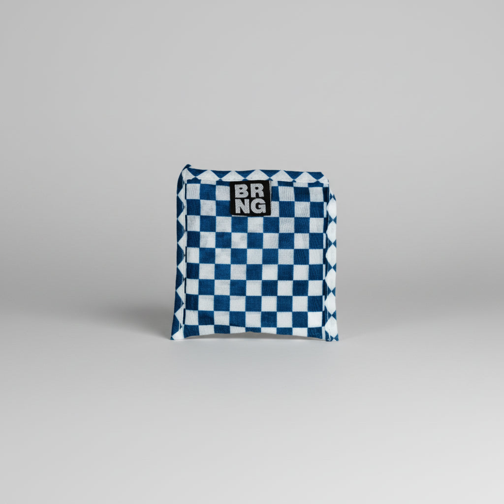 Sally Daily BRNG bag Shopper Mini folded into a compact size with a blue and white checkered pattern on a white background.