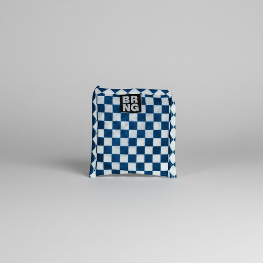 Sally Daily BRNG bag Shopper Mini folded into a compact size with a blue and white checkered pattern on a white background.