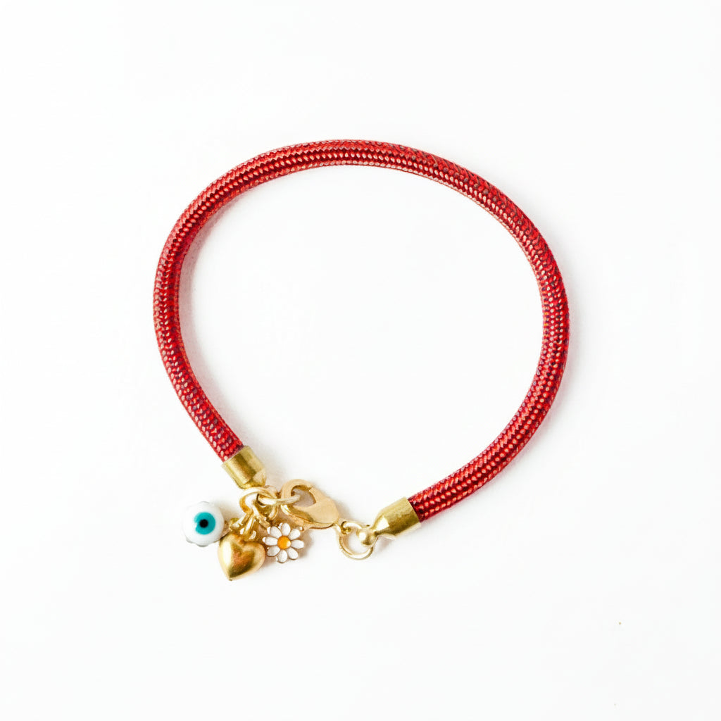 Detail of paracord texture and charm arrangement