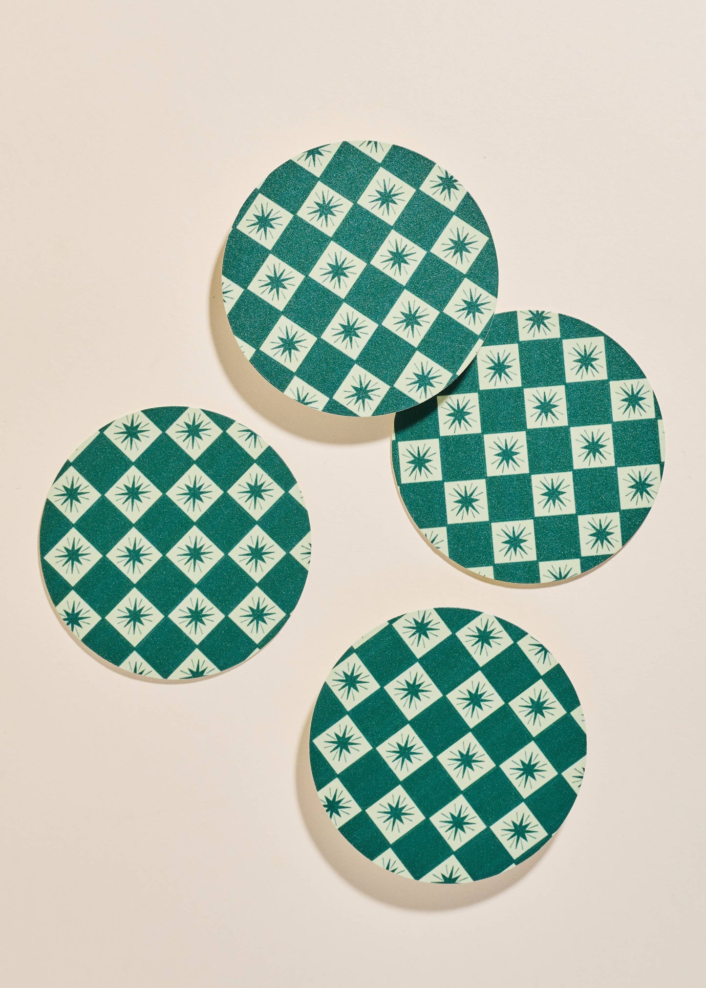 Vibrant green checkered star design on the "Green Checkered Star Coasters"