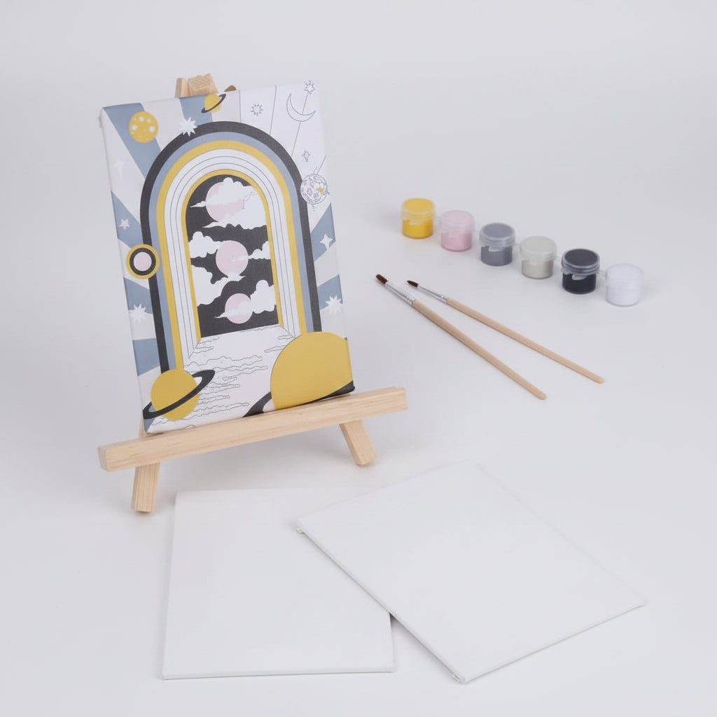 Painting set with canvas, paintbrushes, and paint containers on a white background