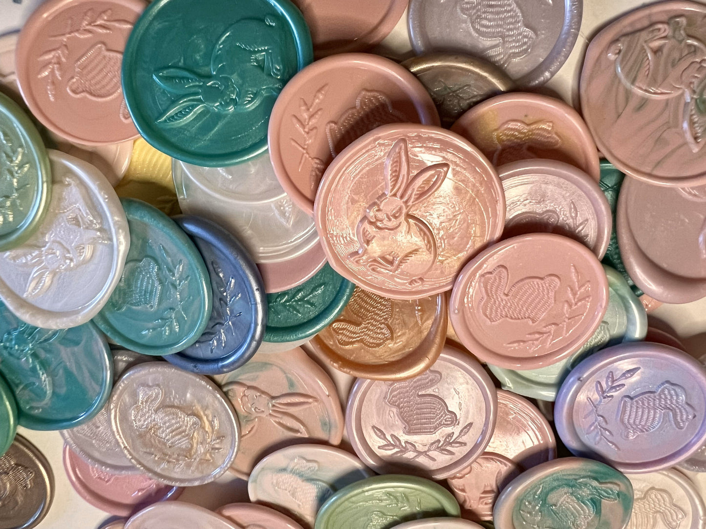 Playful and elegant wax seals in pastel hues, capturing springtime cheer and Easter whimsy.