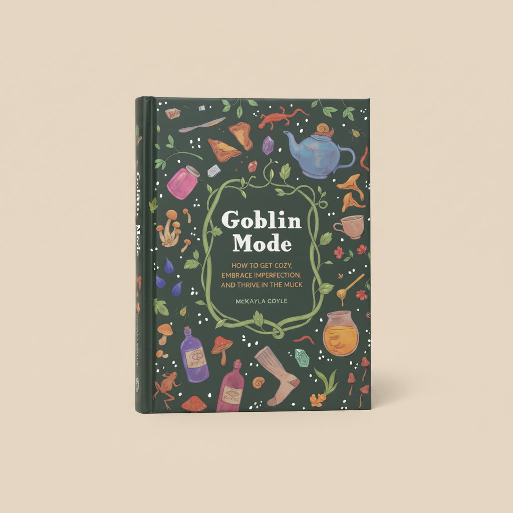 Book titled 'Goblin Mode' with colorful illustrations on a dark green background