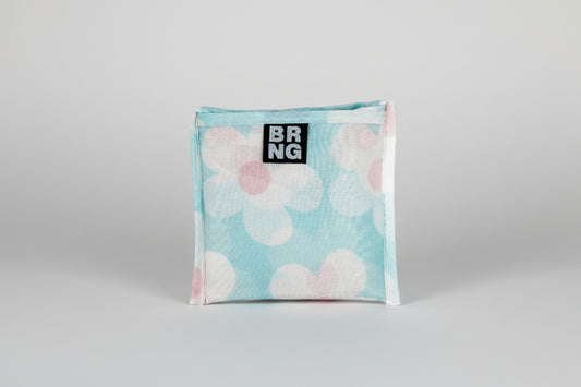 Close up of Hello Dolly Shopper from BRNG Bag folded up on a white background