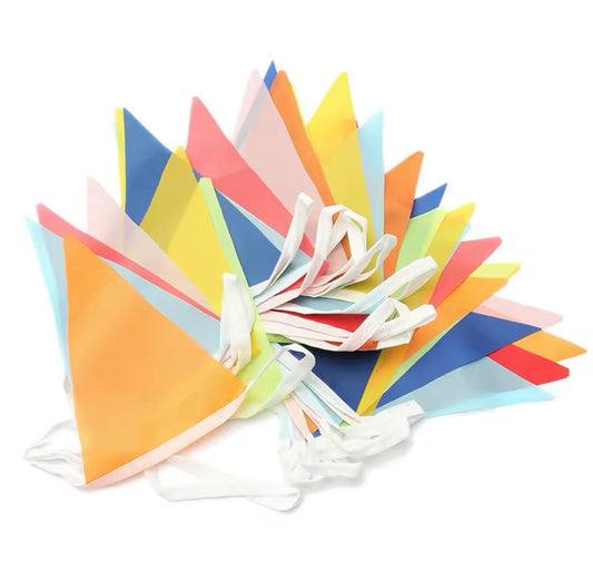 Rolled garland showing stitching details and multicolor fabric flags