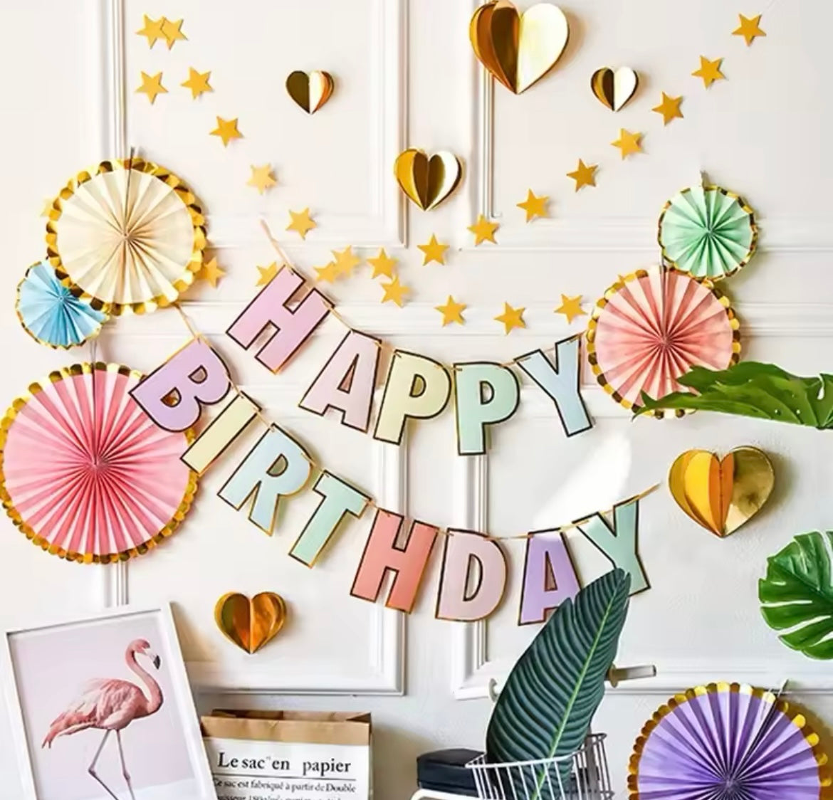 Garland displayed with pastel balloons and rainbow decor