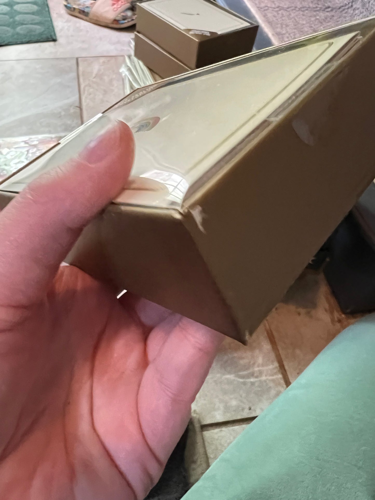 Image shows additional damage to exterior of the box