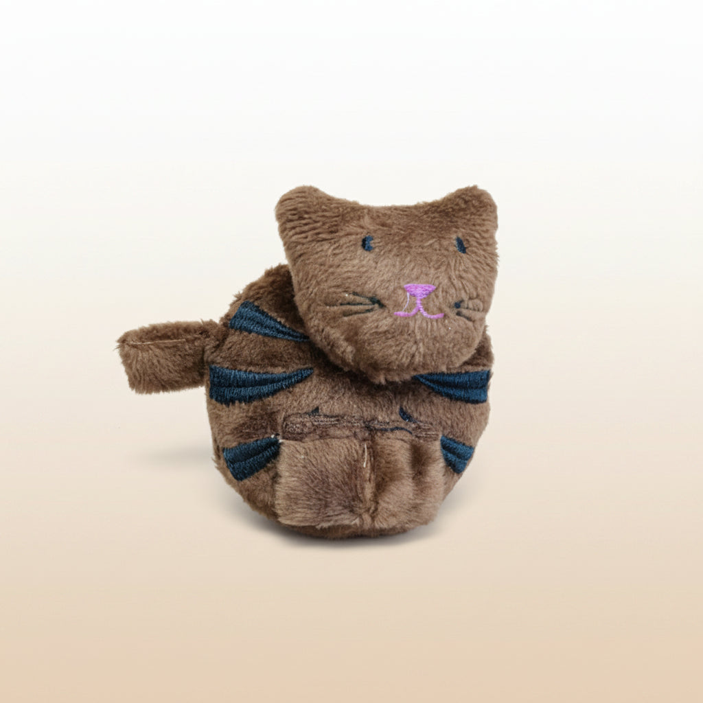 Brown plush cat measuring tape on a light gray background