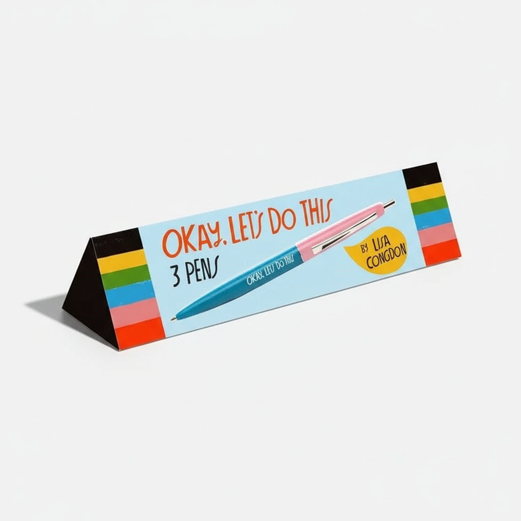 Set of three Lisa Congdon pens with motivational phrases on a colorful background