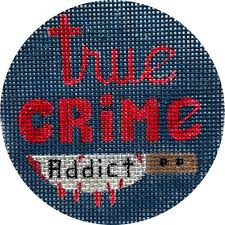 Image of cross-stitching that says, "True Crime Addict" with a knife