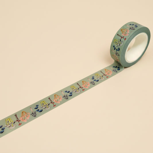 Roll of soft green washi tape with various mushrooms and various colors
