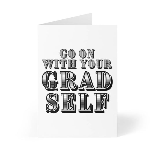 "Go On With Your Grad Self" phrase and kraft envelope