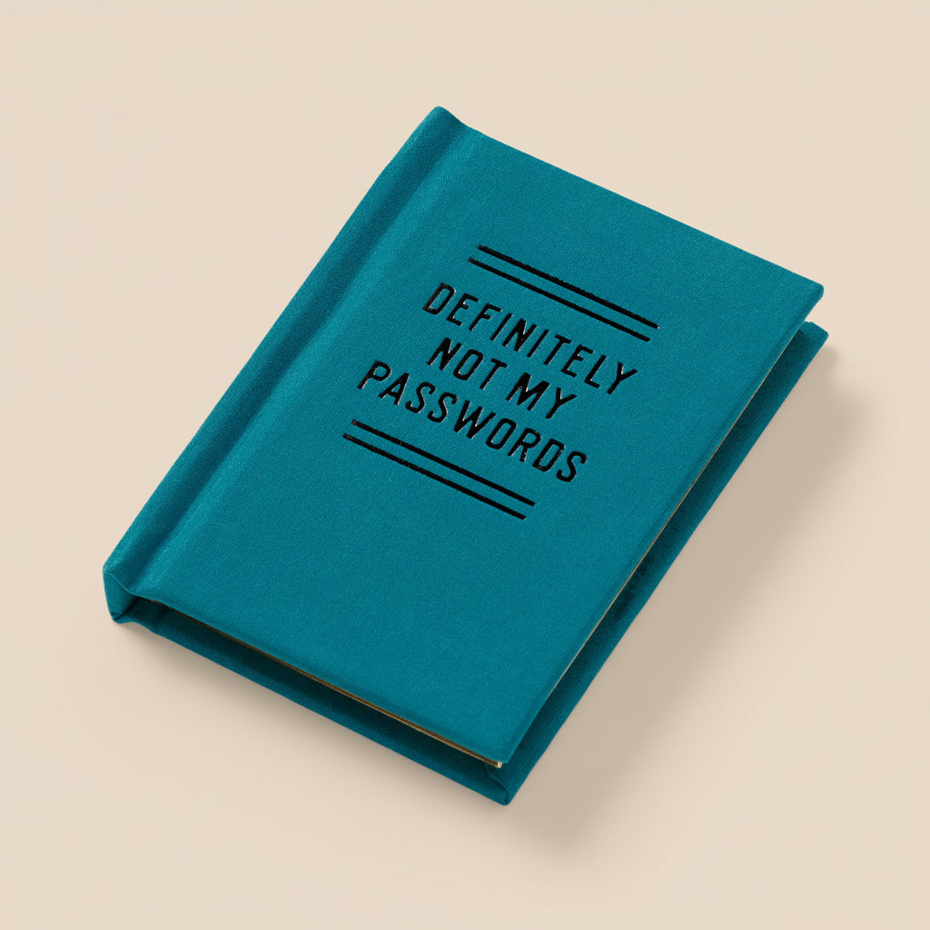 Small but mighty mini teal notebook with 'DEFINITELY NOT MY PASSWORDS' text on a white background
