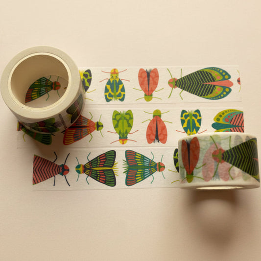 Roll of Mondo Bug Washi Tape featuring large colorful bugs on unspooled strip