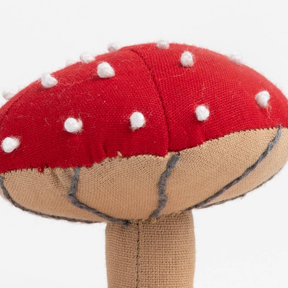Close-up of stitched mushroom cap and soft-textured stem