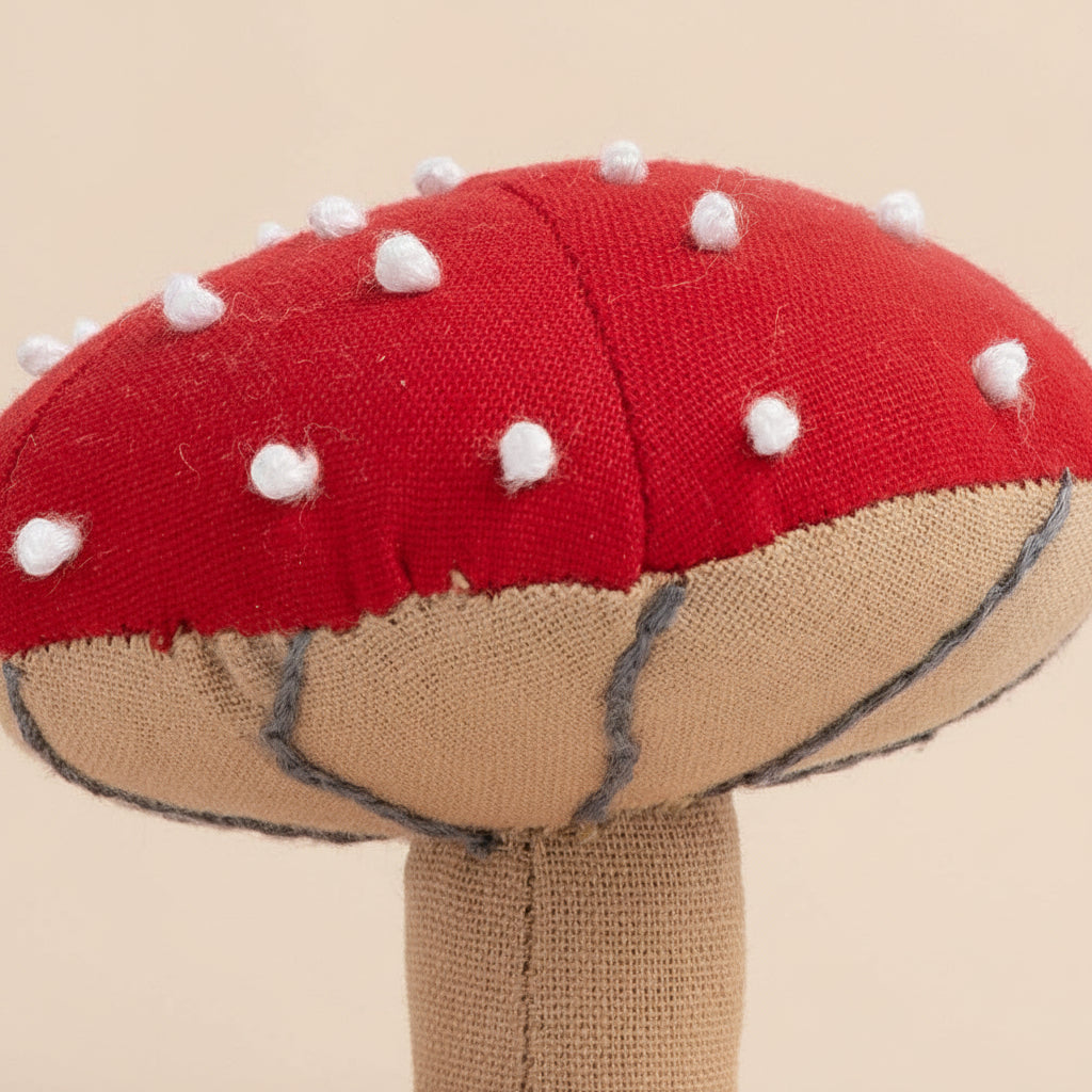 Close-up of stitched mushroom cap and soft-textured stem