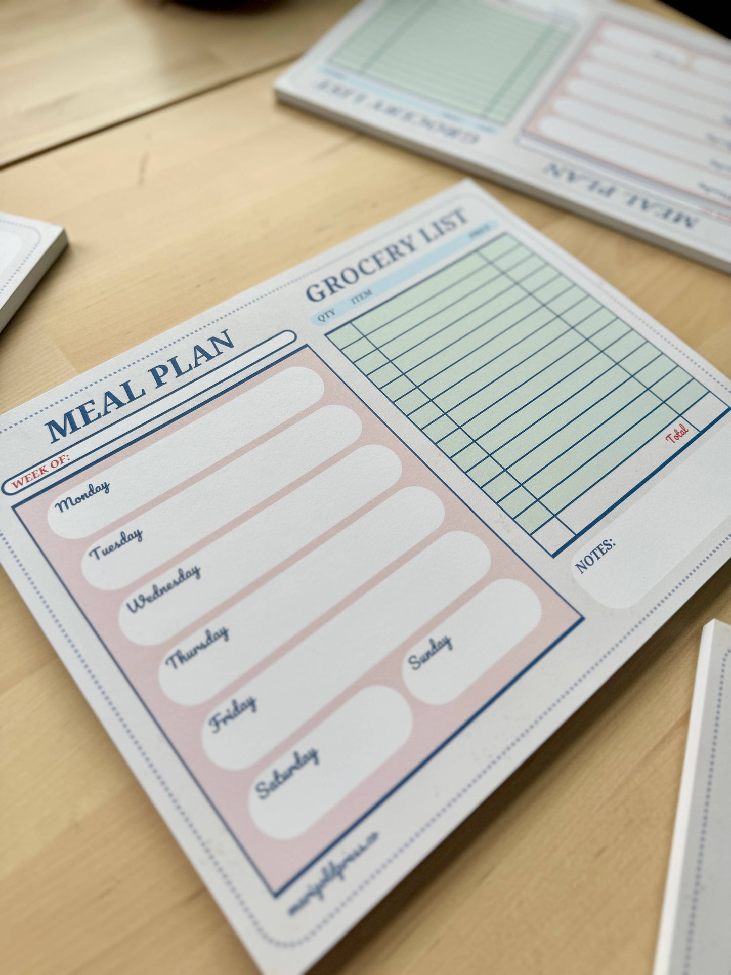 Meal planner and grocery list notepad for kitchen organization and efficiency