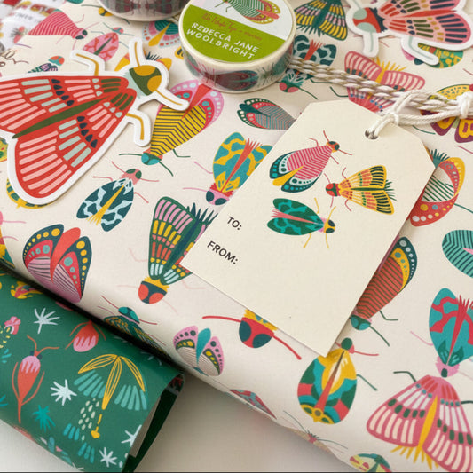 Various Dancing Bug gift products and stickers showcased on a light gray background