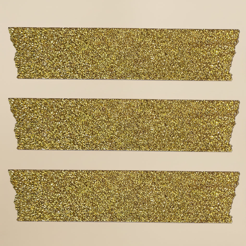 Three strips of the glittery gold washi craft tape on a white background