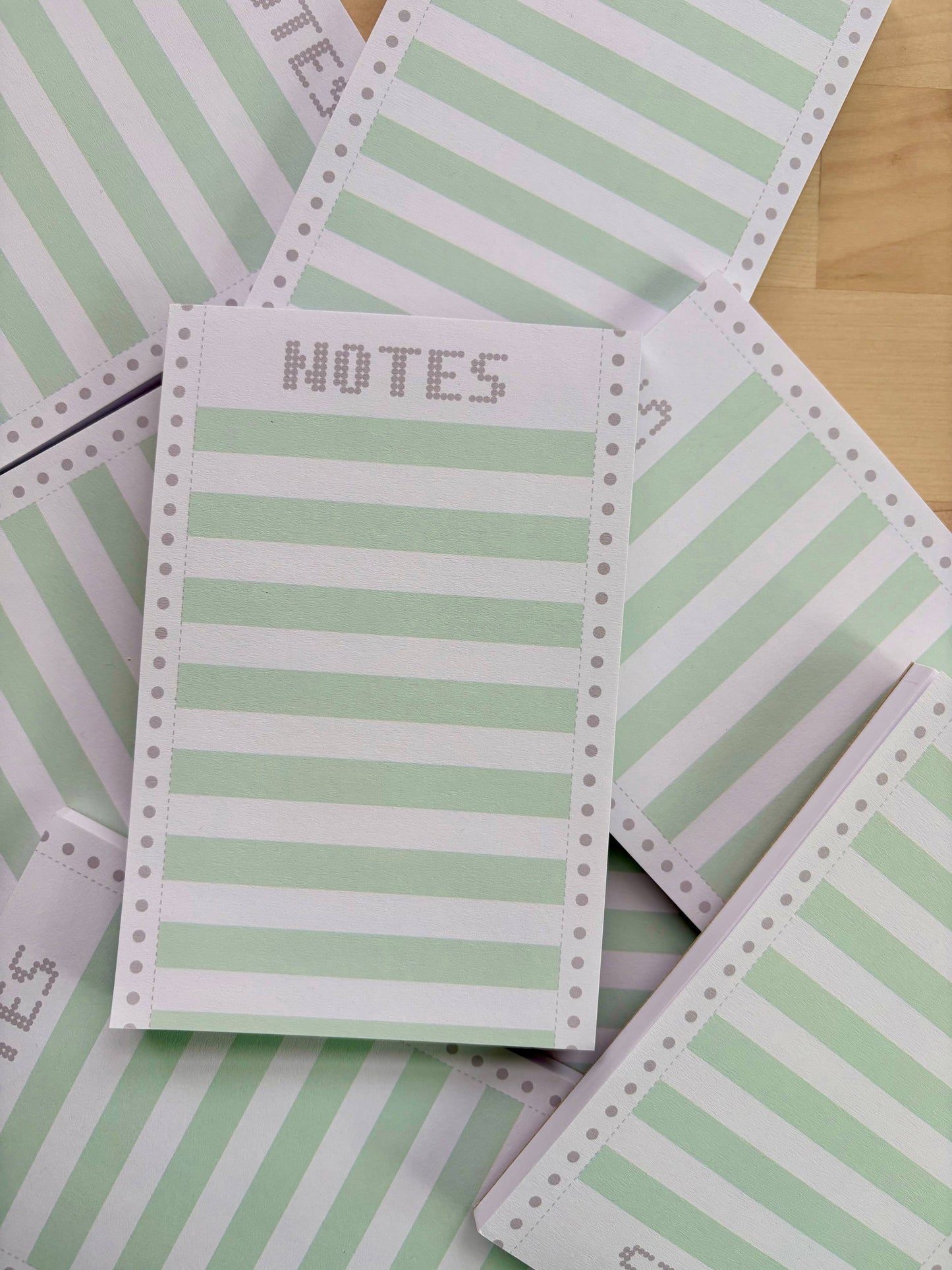 Close up of Retro Dot Matrix Notepad with a Vintage Design