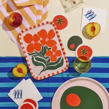 Summer table decorated with hints of the Mediterranean including olive coasters