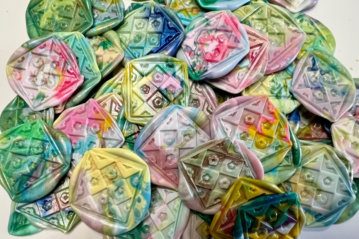 Image of Rochambeau Home's Rainbow Dot Wax Seal Stickers with a floral quilted stamp on a white background