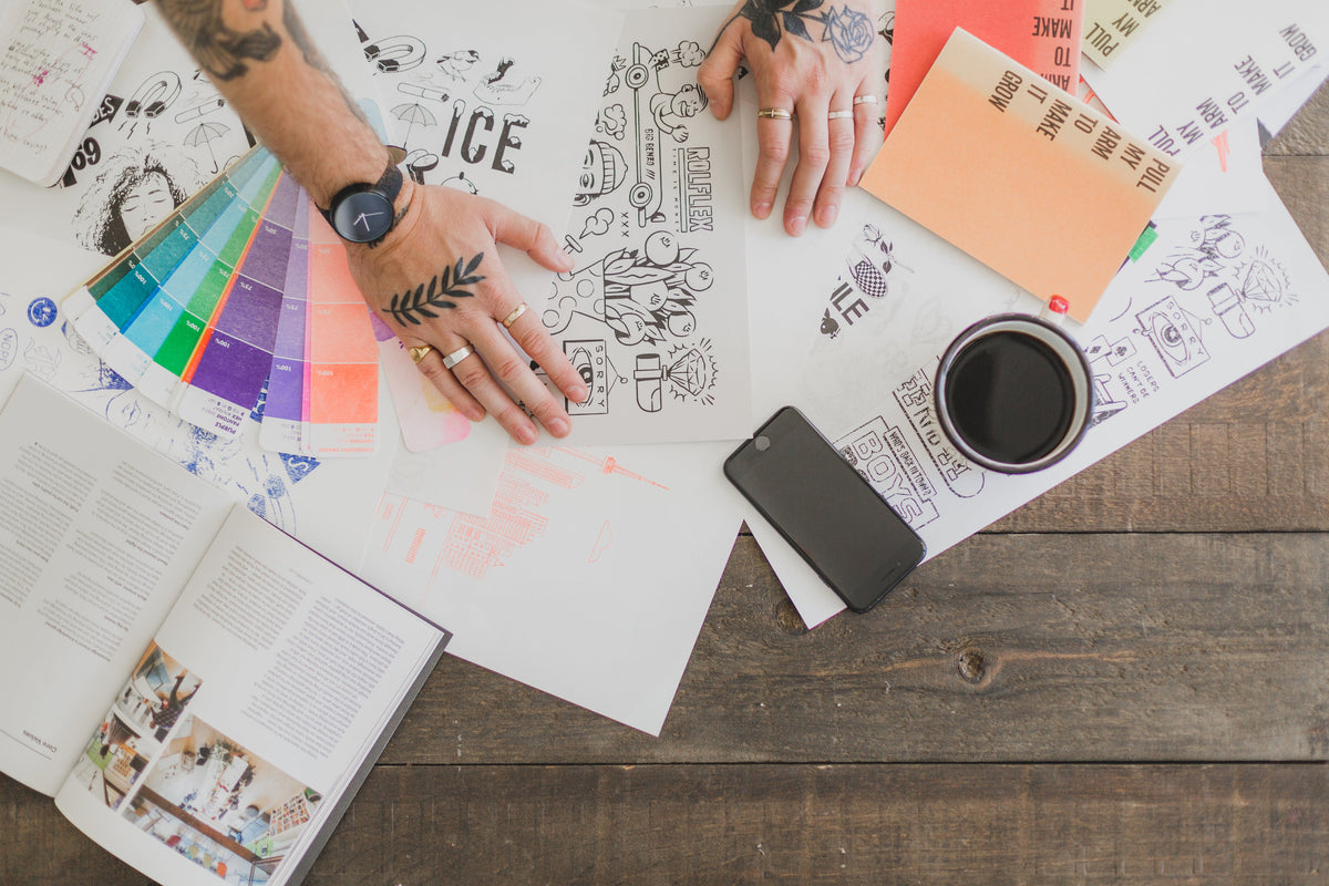 Image of stationery products on the floor as someone is moving them 