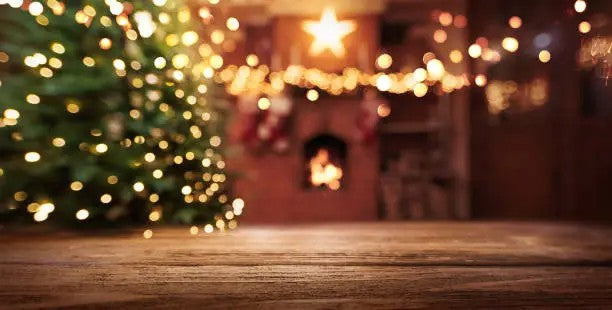 Image of twinkling lights with a holiday background