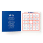 Brass Monkey Survive a Vacation Bingo Book open with pre-filled road trip-themed cards