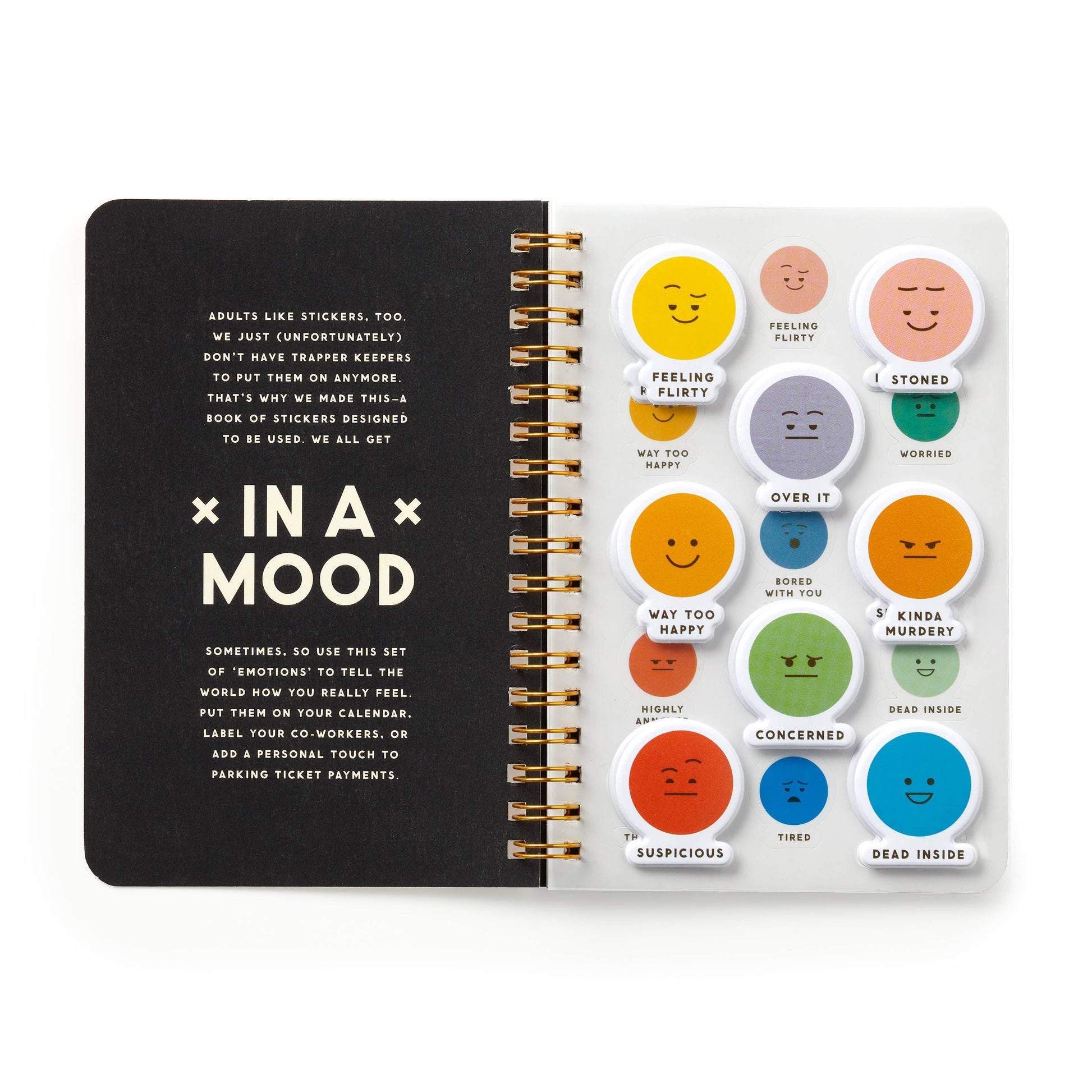 Sticker book featuring a variety of emoticon stickers displayed on a spiral‑bound notebook.