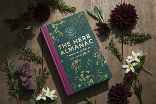 Book cover of 'The Herb Almanac' with illustrations of herbs on a green background