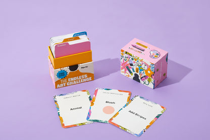 Colorful art challenge cards and packaging on a white background
