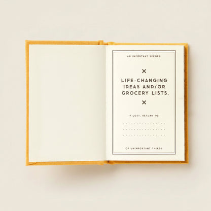 Open book with a title page on a white background