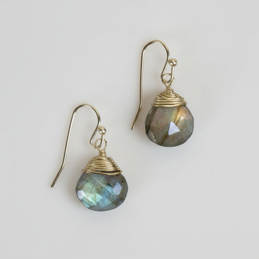 Pair of Labradorite earrings with gold wire wrapping on a white background