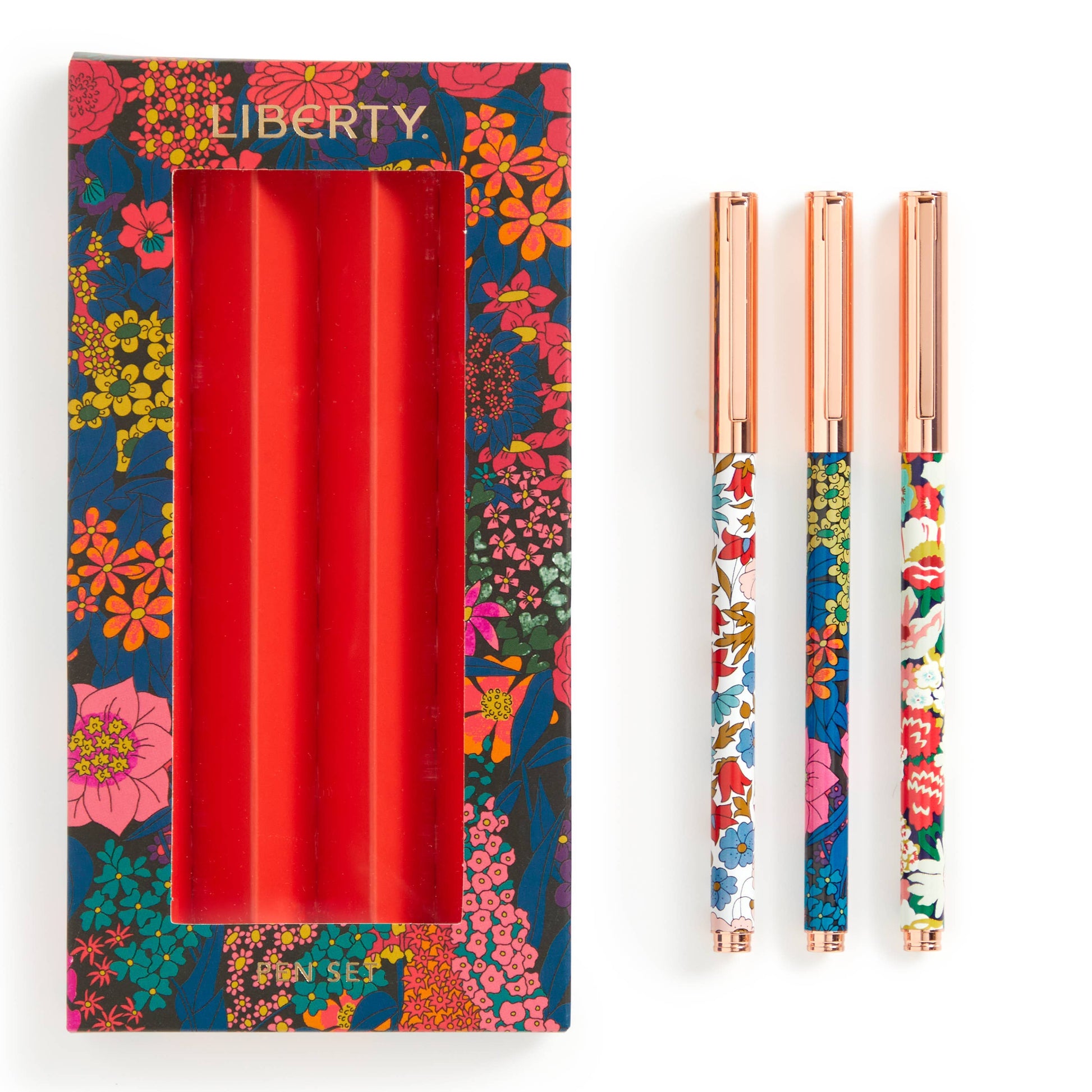 Trio of Liberty London pens displayed diagonally with floral-patterned barrels